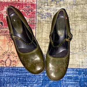 green leather loafers
